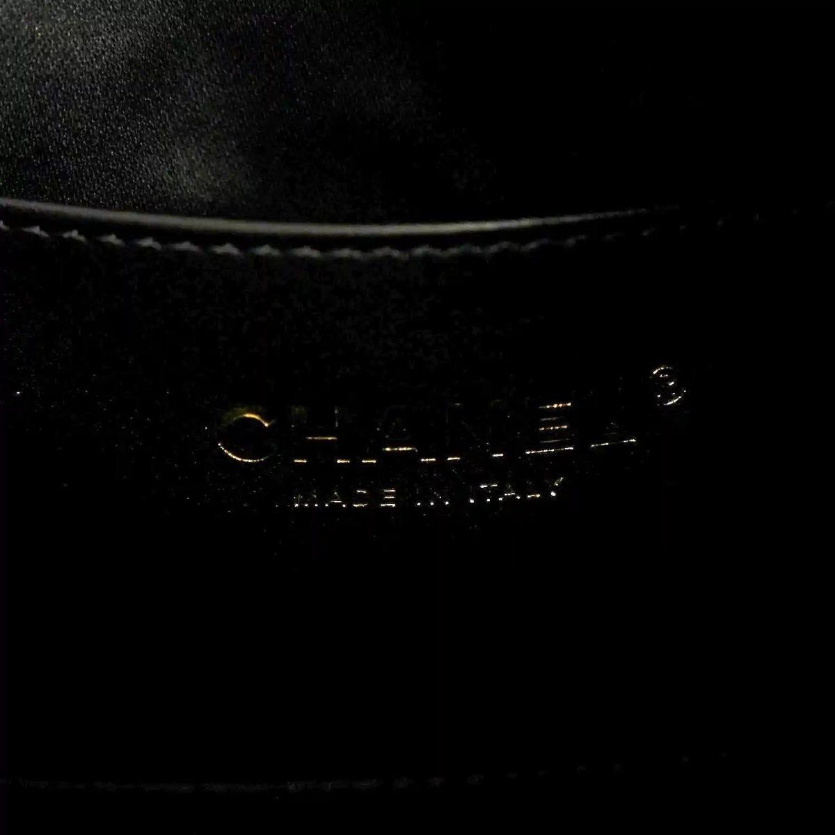 Chanel denim shoulder bag metal stamp on black fabric