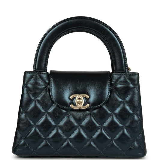 Metallic blue quilted Kelly shopper bag with Chanel logo and gold hardware