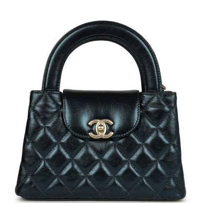 Metallic blue quilted Kelly shopper bag with Chanel logo and gold hardware
