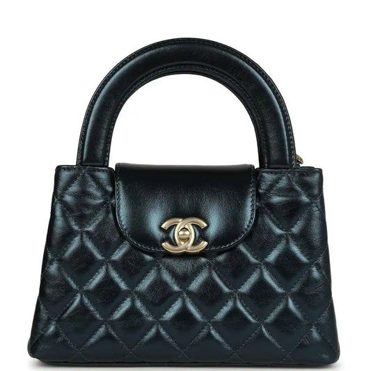 Metallic blue quilted Kelly shopper bag with Chanel logo and gold hardware