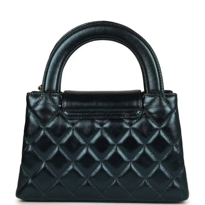 Metallic blue quilted Kelly shopper bag with flap and Chanel logo, gold hardware