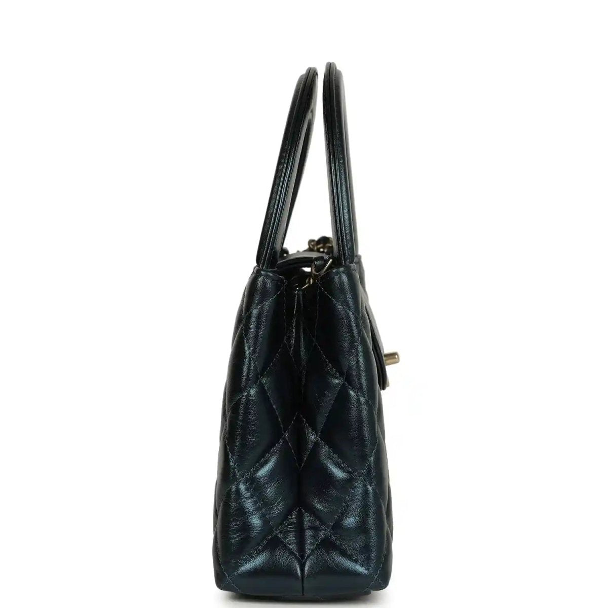 Metallic blue quilted Kelly shopper bag side view with gold-toned hardware