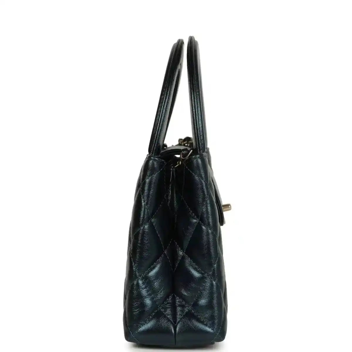 Metallic blue quilted Kelly shopper bag side view with gold-toned hardware