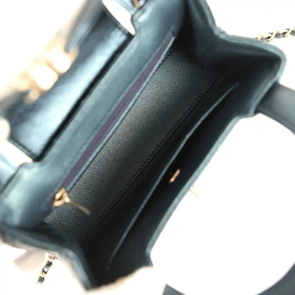 Metallic blue Kelly shopper interior lining with top edges and gold hardware