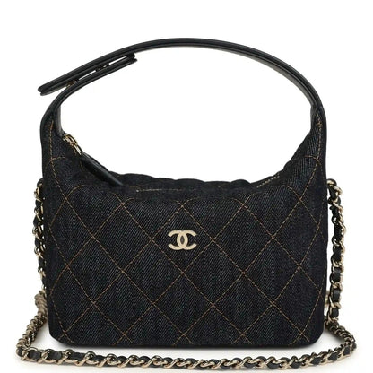 Chanel mini hobo pouch in dark blue denim with gold-tone chain straps and logo