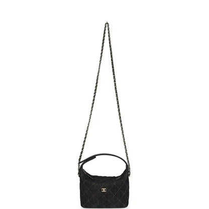 Chanel mini hobo pouch in dark blue denim with long chain strap and logo emblem