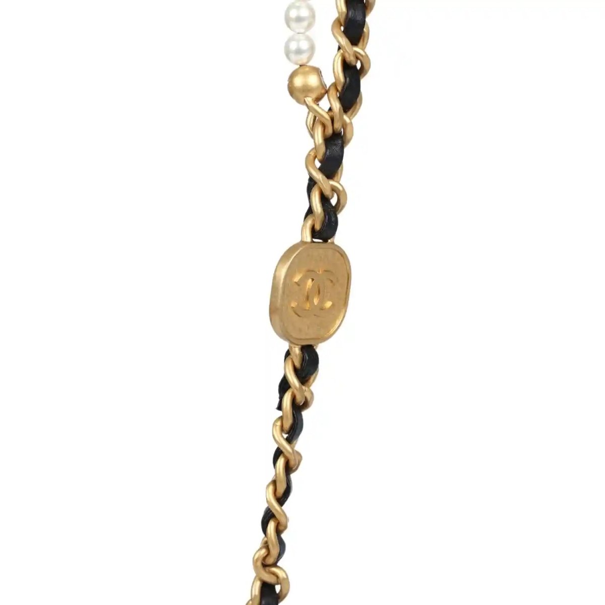 Pearl and gold chain strap detail for black quilted flap bag with clasp hardware