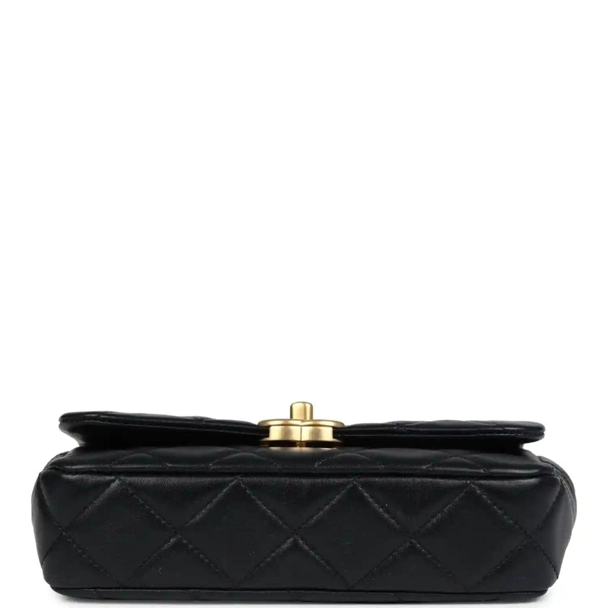 Black quilted lambskin flap bag with round gold top hardware on the back side
