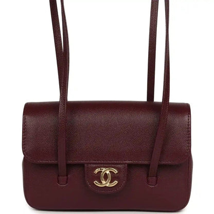 Mini clutch bag in dark burgundy shiny caviar leather, top flap with strap handles
