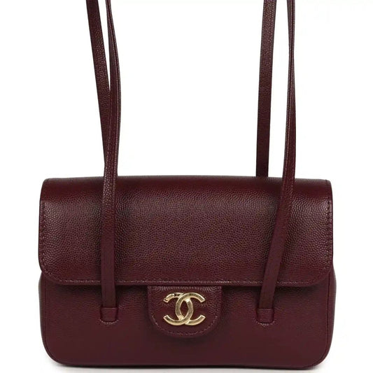 Mini clutch bag in dark burgundy shiny caviar leather, top flap with strap handles