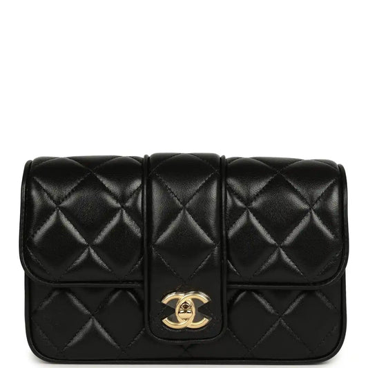 Chanel mini flap bag in black quilted lambskin with gold turn-lock