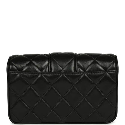 Chanel mini flap bag back in black quilted lambskin with curved flap edge