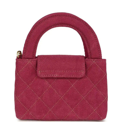 Fuchsia denim mini tote bag with quilted pattern, front flap, and gold CC clasp