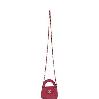 Fuchsia denim mini crossbody bag with short top handle, gold CC emblem, chain strap