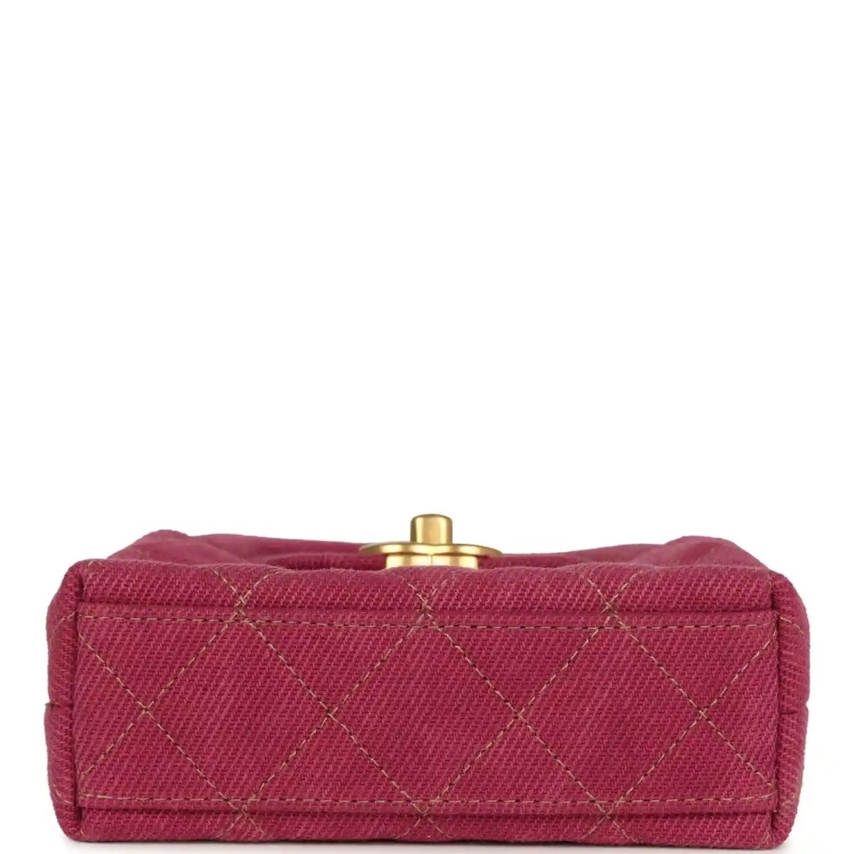 Fuchsia denim mini bag with quilted front and gold snap clasp on top flap