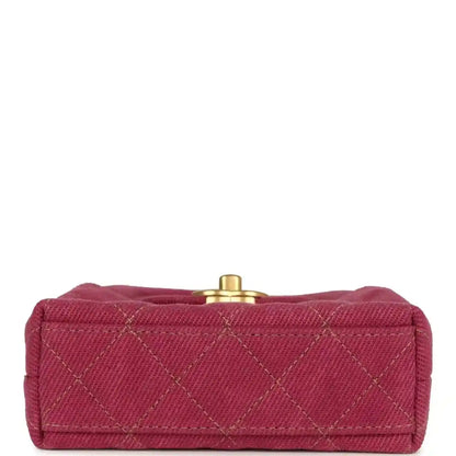 Fuchsia denim mini bag with quilted front and gold snap clasp on top flap