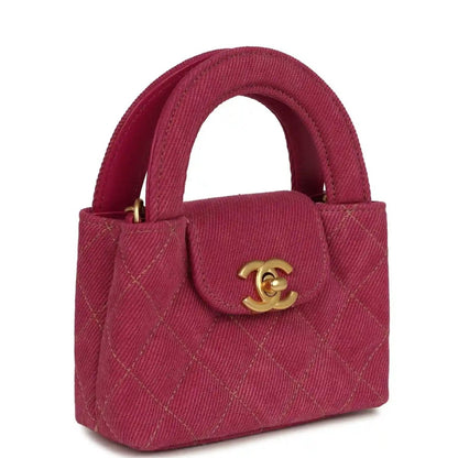 Fuchsia denim mini shopper bag with quilted texture and brushed gold CC clasp