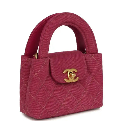 Fuchsia denim mini shopper bag with quilted texture and brushed gold CC clasp