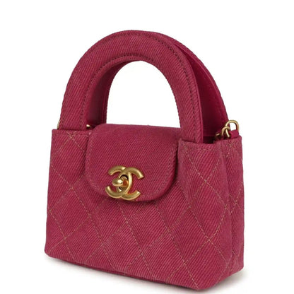 Fuchsia denim mini shopper with quilted front, top handles, and gold CC turn-lock