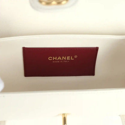 Chanel preppy bowling bag, burgundy interior logo patch with gold lettering