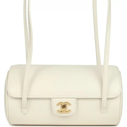 Chanel preppy bowling bag, white shiny caviar leather, front profile with gold emblem