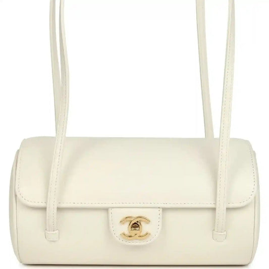 Chanel preppy bowling bag, white shiny caviar leather, front profile with gold emblem