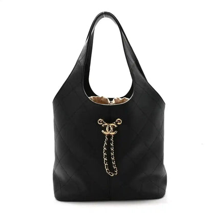 Chanel quilted calfskin large shopping tote bag, black, chain detail and gold logo