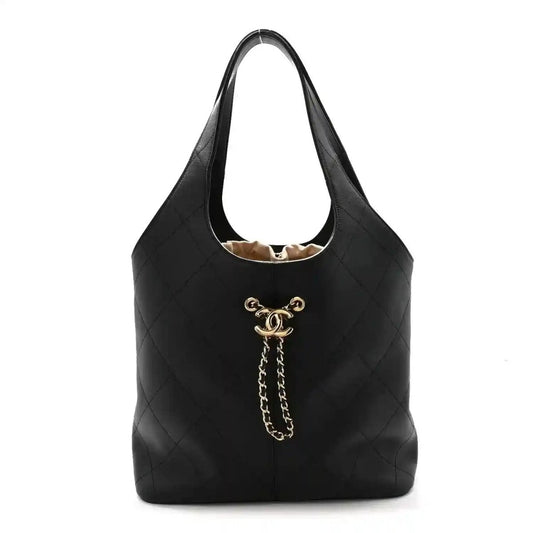 Chanel quilted calfskin large shopping tote bag, black, chain detail and gold logo