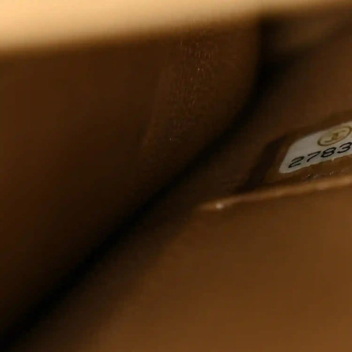 Chanel interior leather with small stitched tag detail