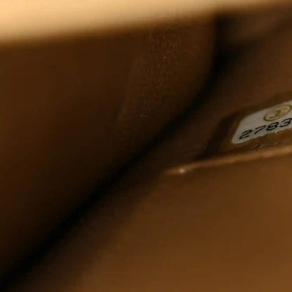 Chanel interior leather with small stitched tag detail