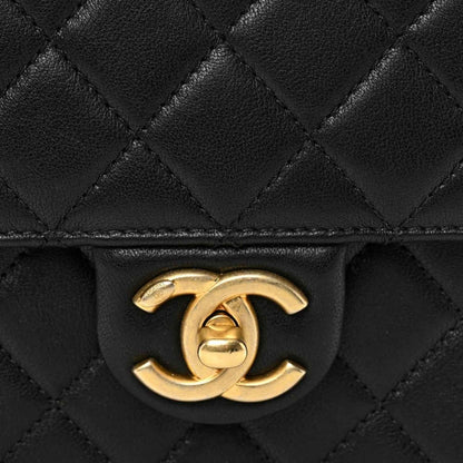 Chanel quilted black flap bag with gold-tone CC turn-lock clasp