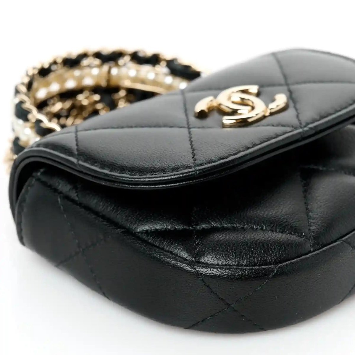 Black quilted lambskin clutch with gold CC clasp and chain, rounded top