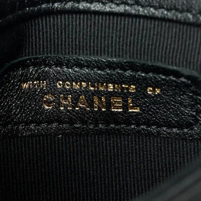 CHANEL embossed leather label inside pocket