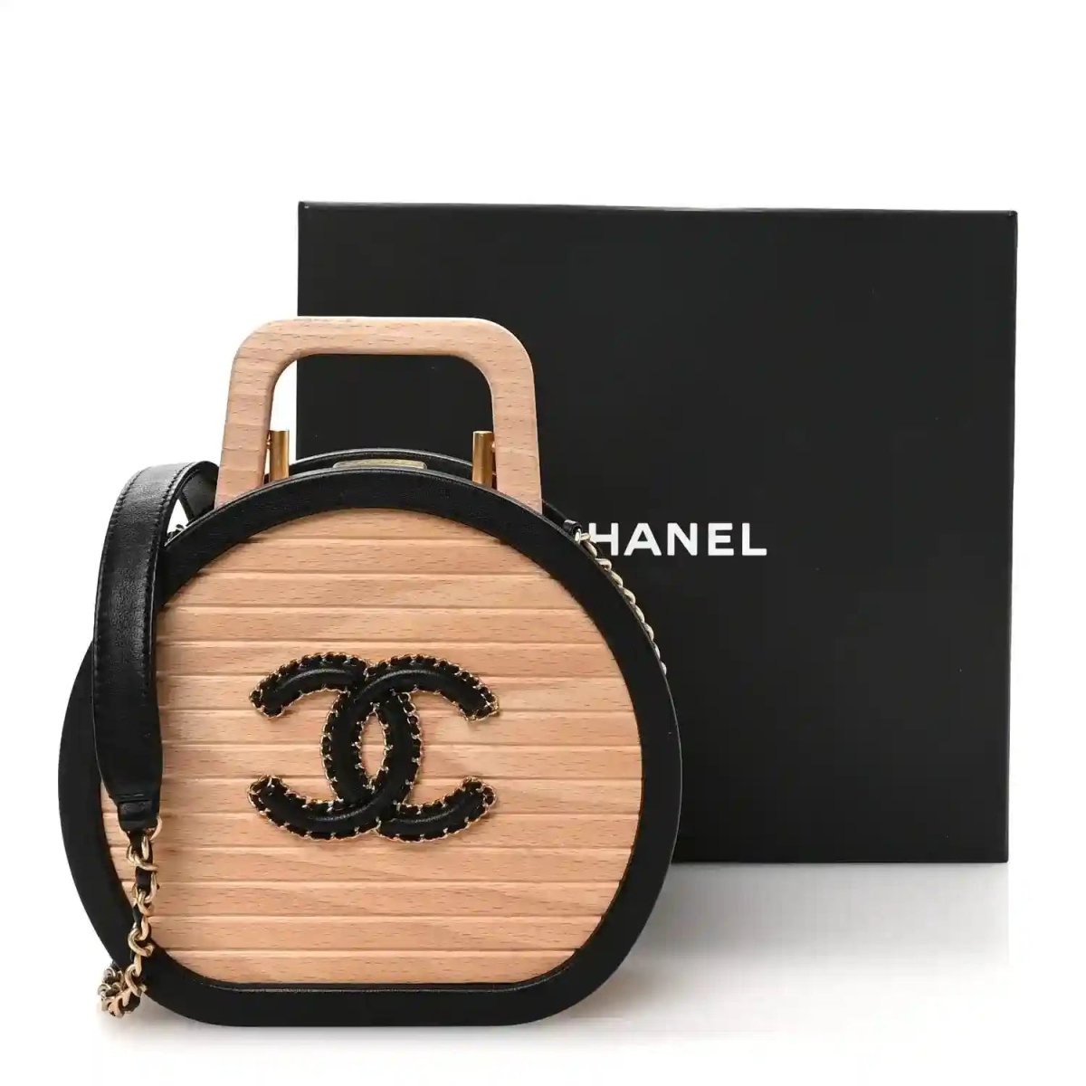 Chanel round vanity case with black lambskin trim and beech wood body, CC emblem.