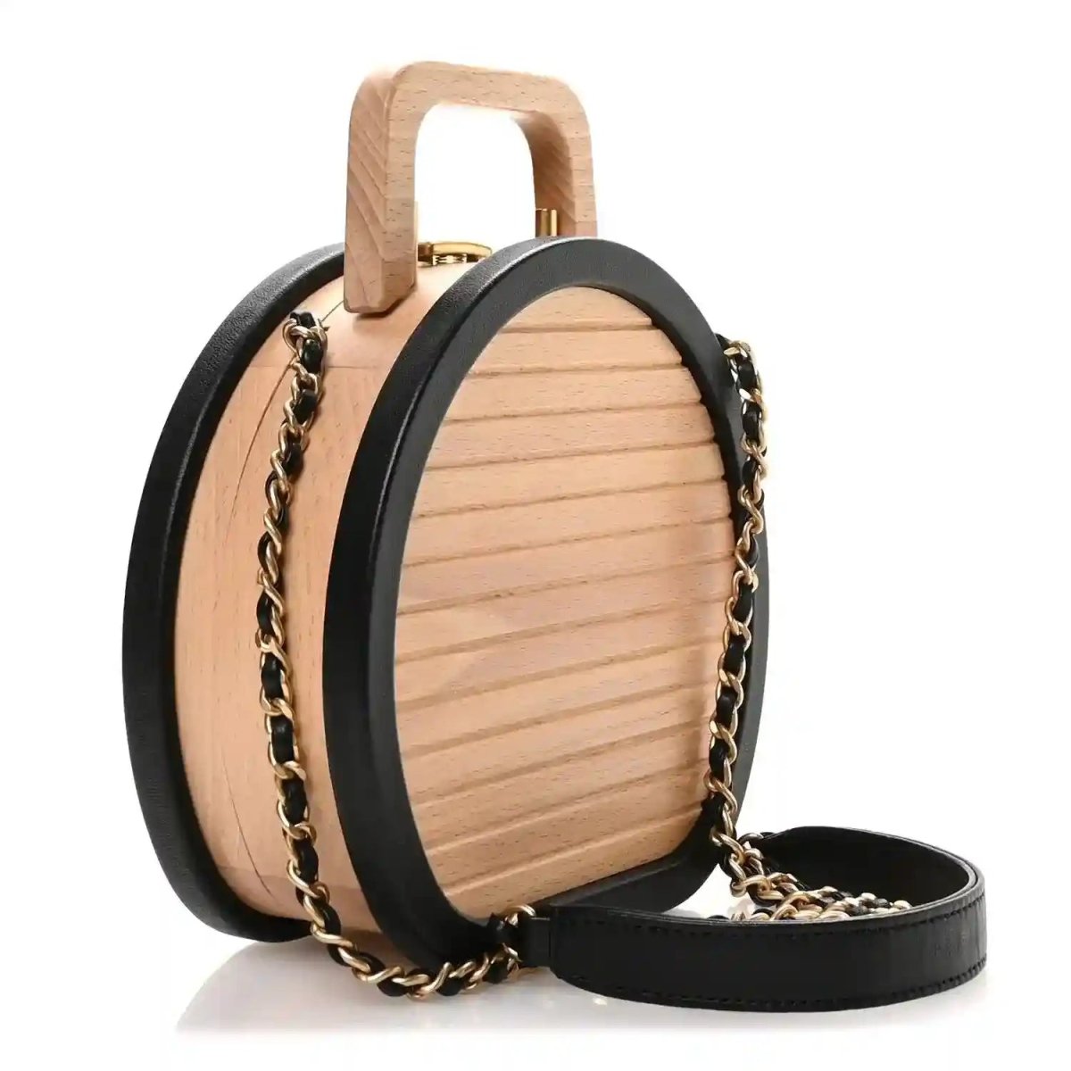 Chanel round vanity case with light wood body, black leather trim, and gold chain strap