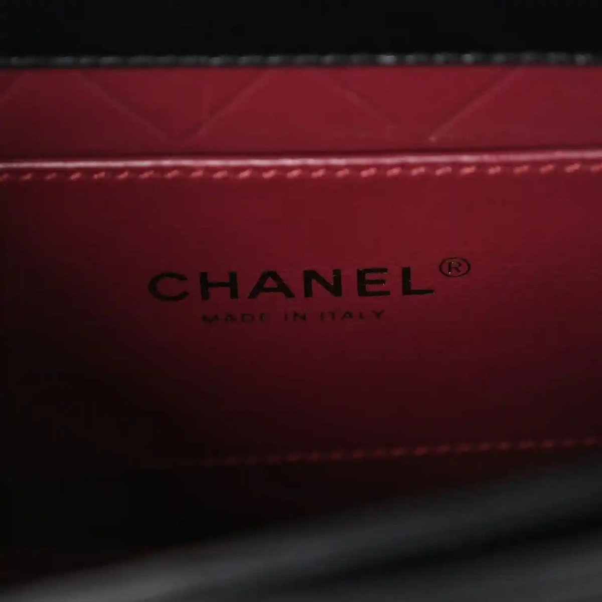 Red leather lining with CHANEL® and Made in Italy stamp