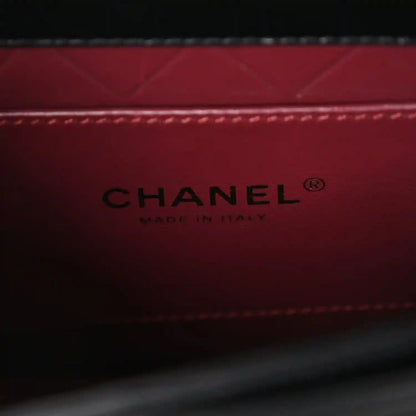 Red leather lining with CHANEL® and Made in Italy stamp