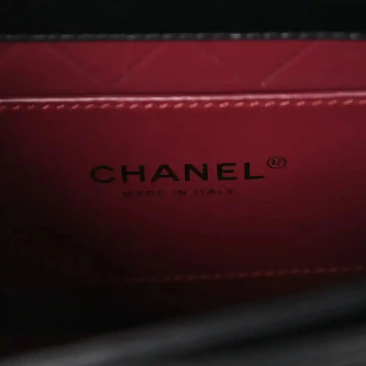 Red leather lining with CHANEL® and Made in Italy stamp