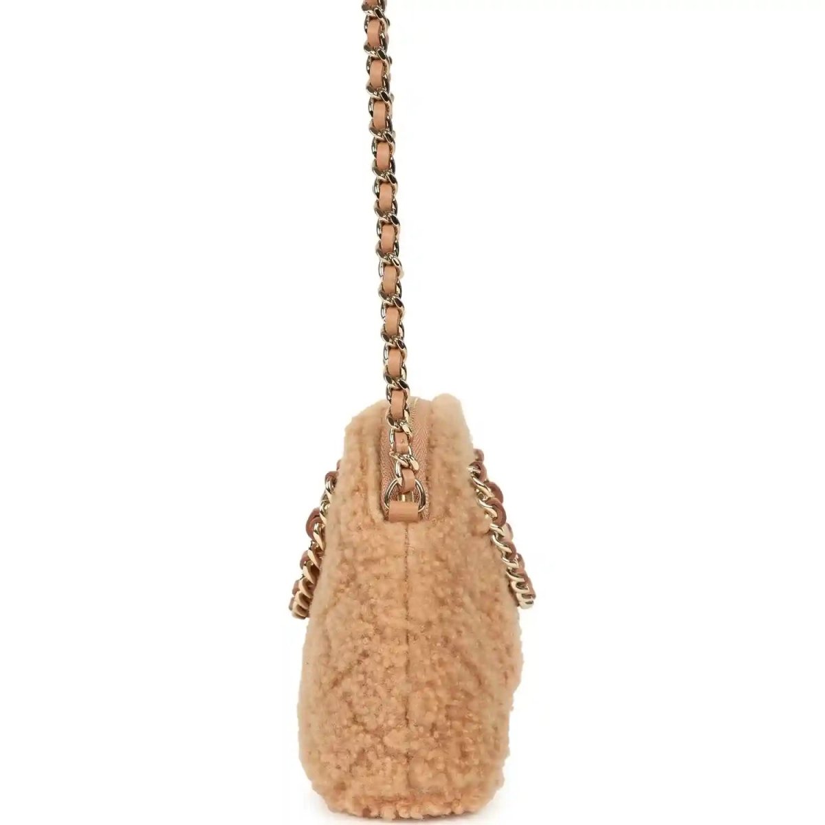 Beige shearling mini crossbody bag with gold chain strap and top handle tab