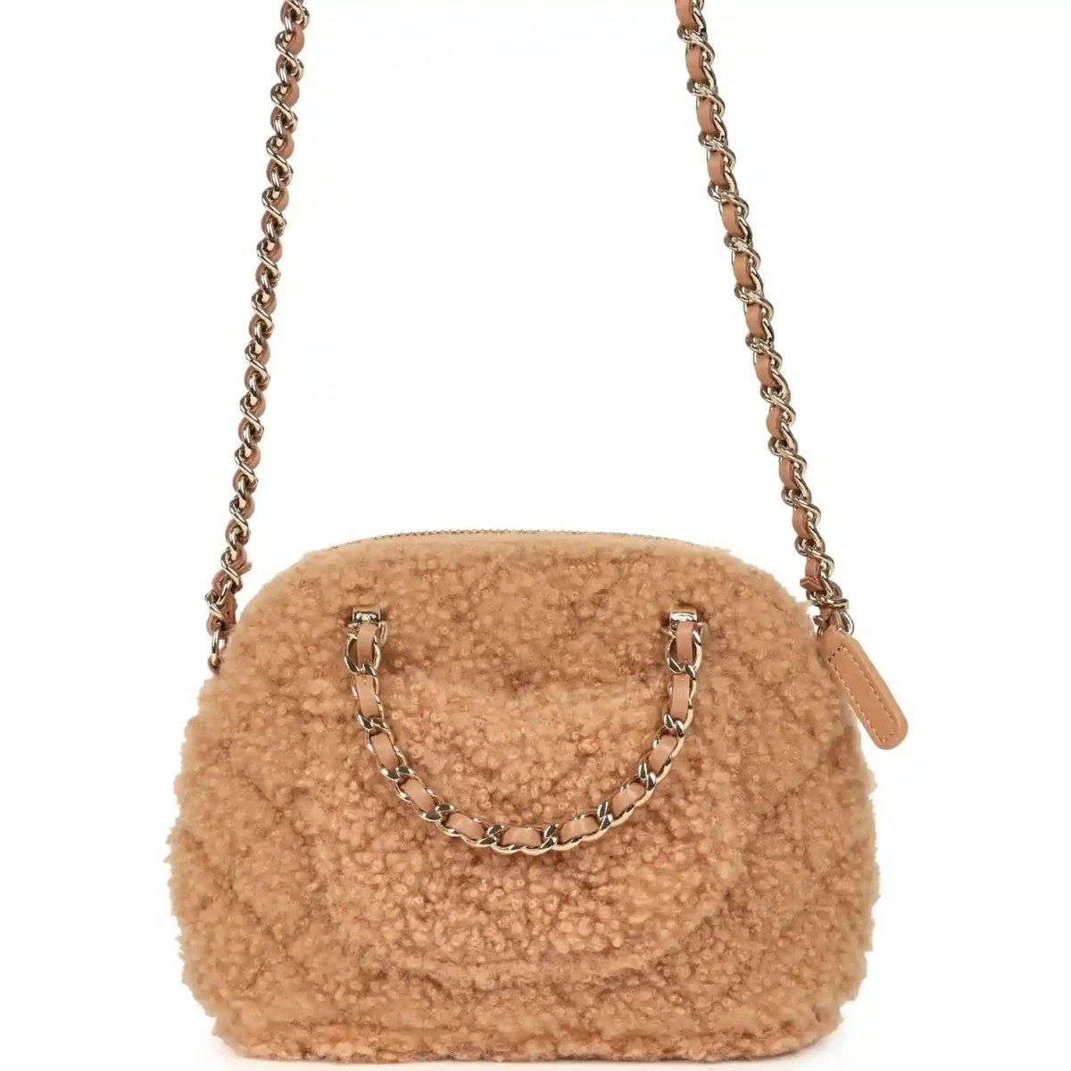 Beige shearling dome crossbody bag with gold chain, front CC hardware, and side tag