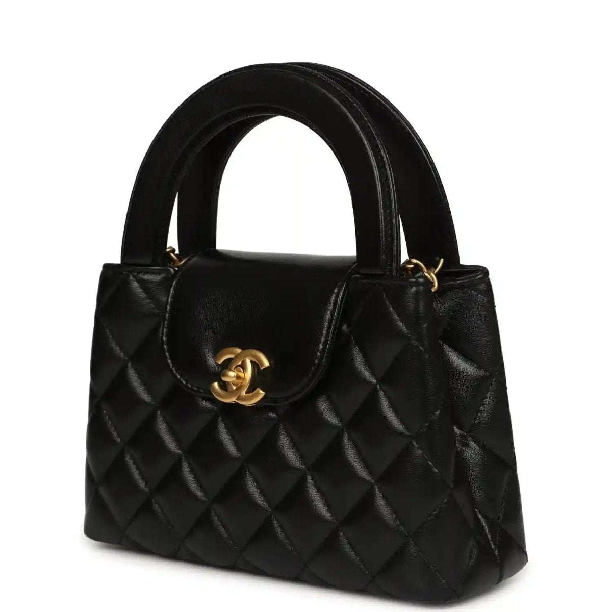Chanel Kelly shopper bag in black quilted leather with gold CC clasp on front flap