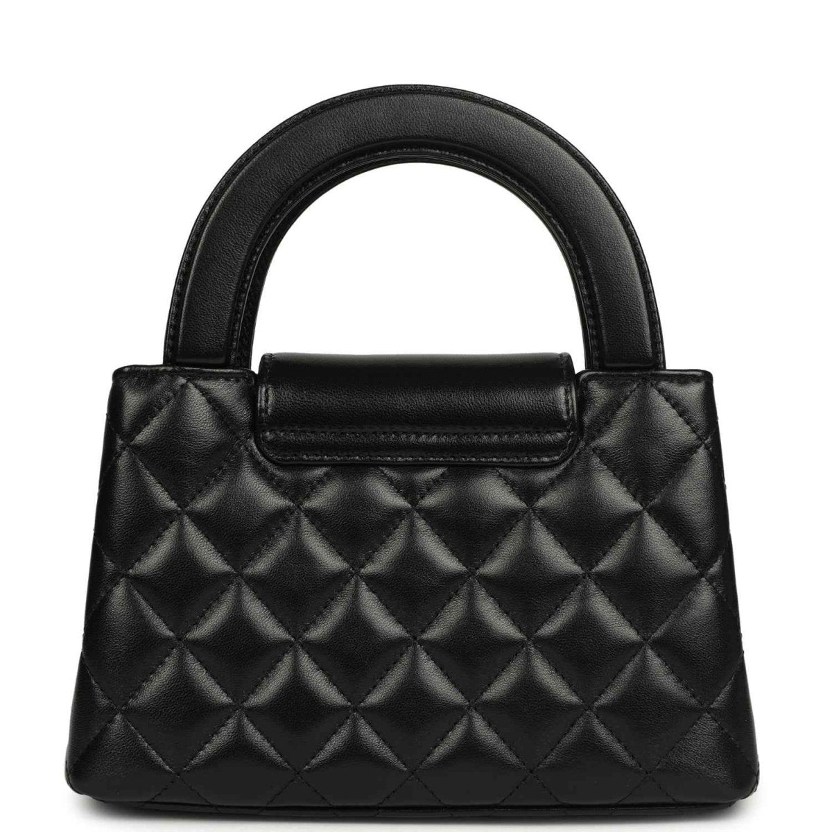 Chanel Kelly shopper bag in black quilted leather with structured top handles and front flap