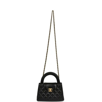 Chanel Kelly mini shopper bag in black quilted leather with long chain strap and CC detail