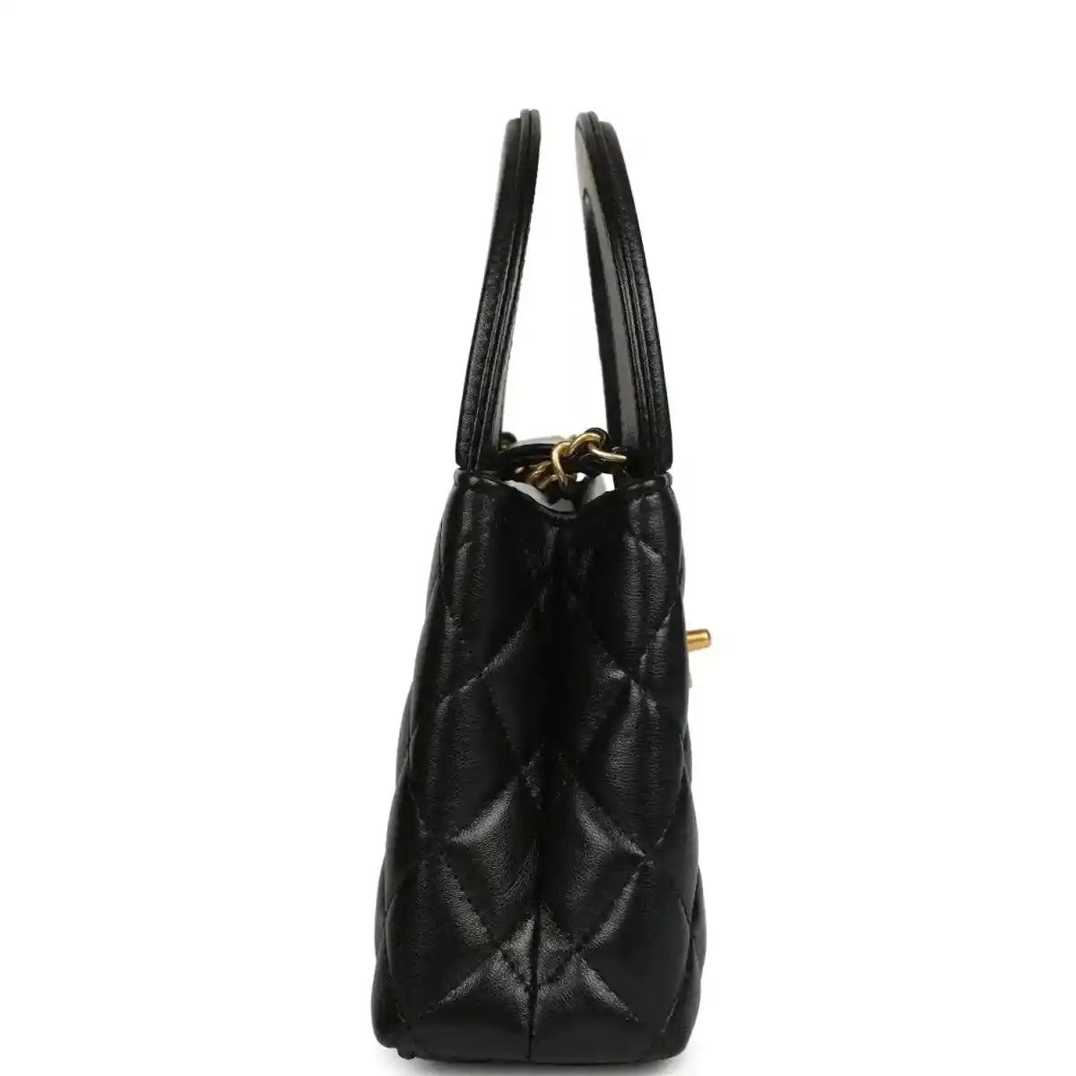 Chanel Kelly shopper bag in black quilted leather with side view and dual top handles