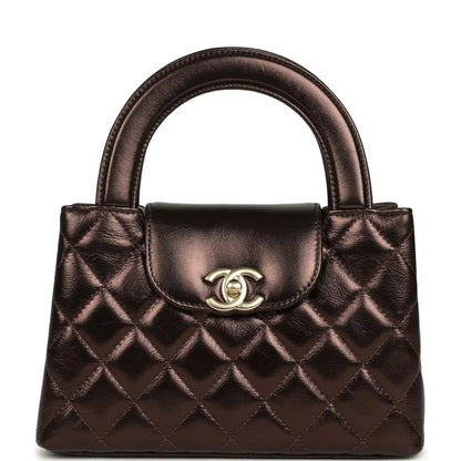Quilted small shopper bag in dark bronze with top handles and front flap clasp