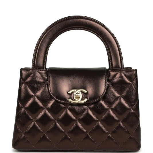 Quilted small shopper bag in dark bronze with top handles and front flap clasp