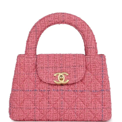 Pink tweed small shopper bag with top handle, front flap, and gold CC clasp