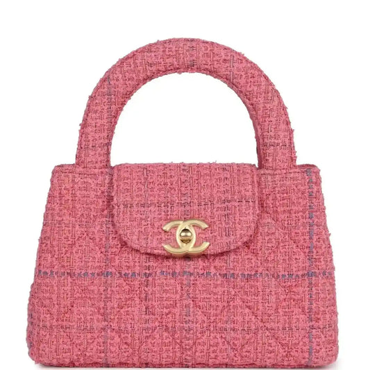 Pink tweed small shopper bag with top handle, front flap, and gold CC clasp