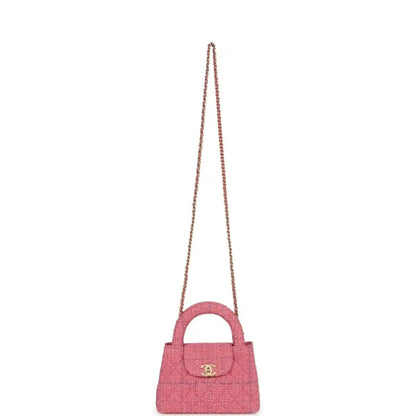 Pink tweed mini shopper bag with top handle and long chain strap