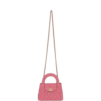 Pink tweed mini shopper bag with top handle and long chain strap